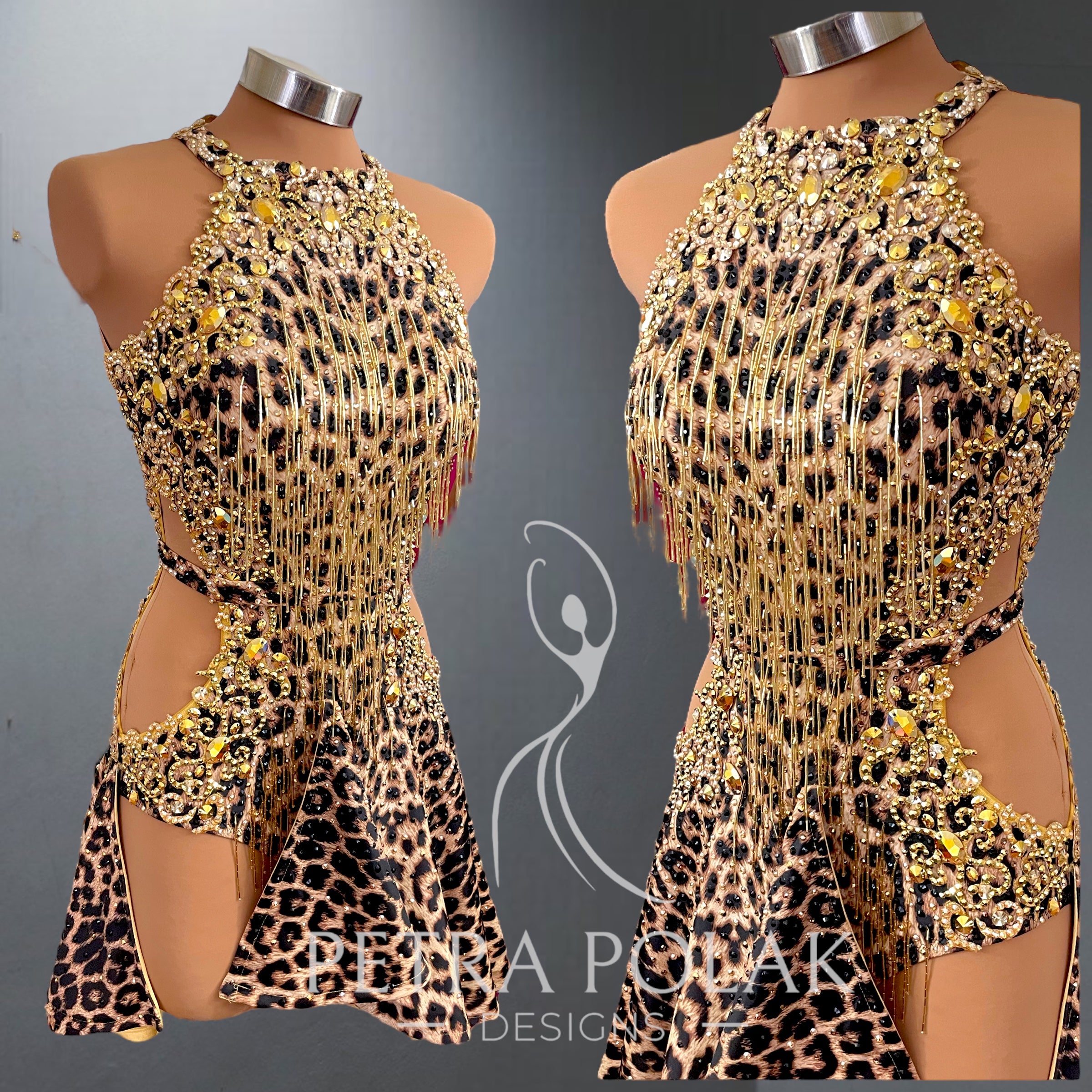 Gold and leopard print dress on mannequins with A Polak Design logo.