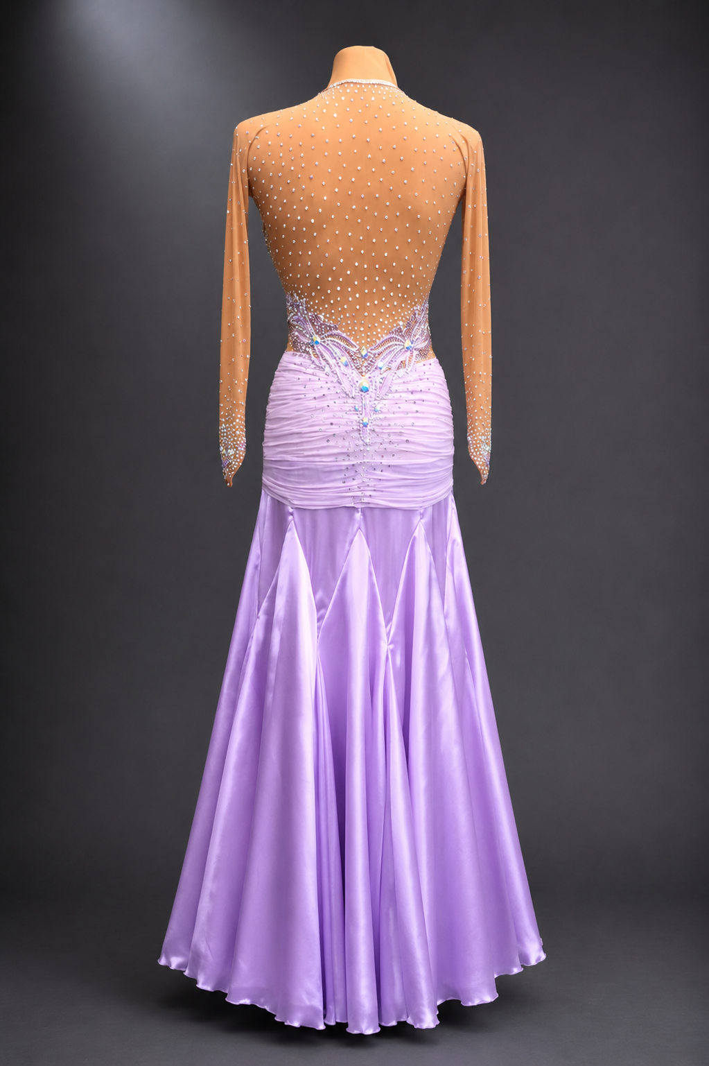Purple ballroom dance dress on a mannequin against a dark background