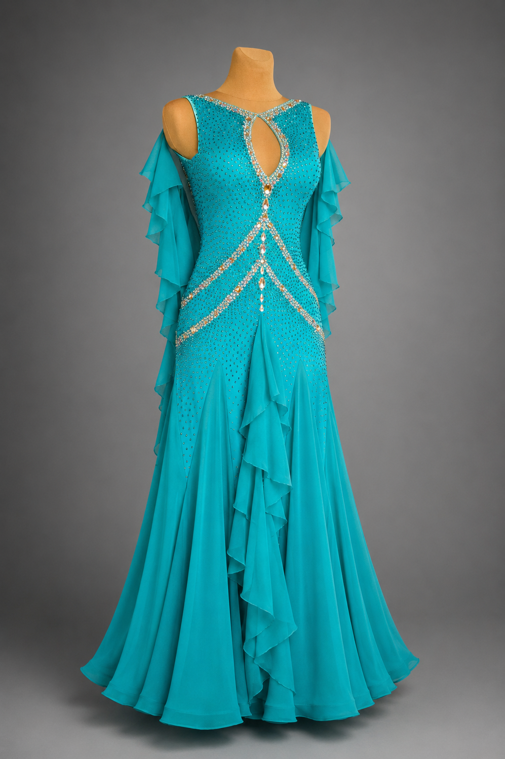 Teal evening gown with ruffled details on a gray background