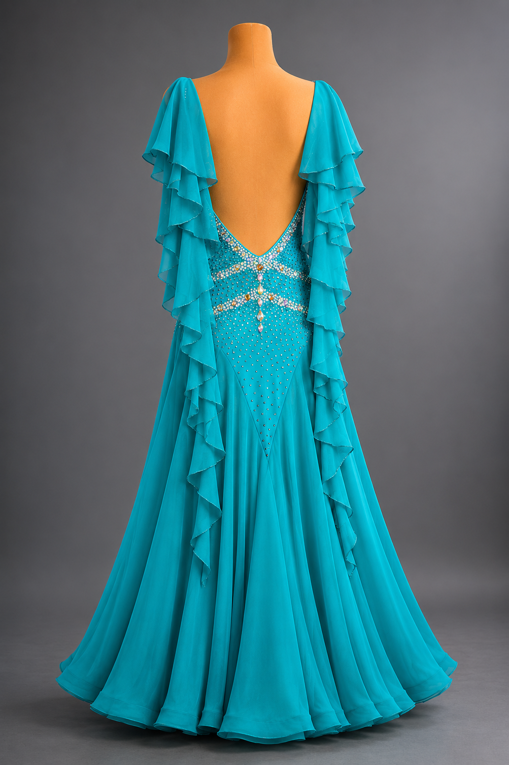 Turquoise evening gown with ruffled details on a gray background